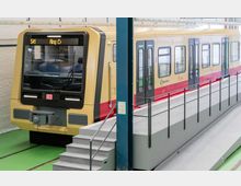 Nahaufnahme einer gelb-roten Berliner S-Bahn in einer Halle. Die Bahn zeigt die Anzeige "S41 Ring" und steht auf einem Gleis neben einer erhöhten Plattform mit Geländer und Treppe.