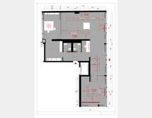 Architektonischer Grundriss einer Wohnung mit mehreren Räumen, darunter ein Wohnbereich, ein Badezimmer und eine Küche. Der Plan zeigt Wände, Türen, Möblierungen sowie Beleuchtungspositionen, die durch rote Markierungen hervorgehoben sind. Maßangaben sind entlang der Ränder angegeben.